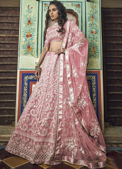 Peach soft net pearl and thread work bridal lehenga choli