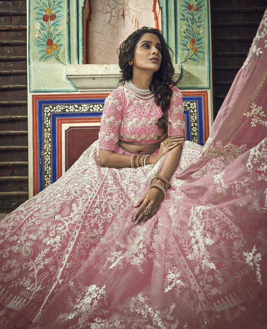 Peach soft net pearl and thread work bridal lehenga choli