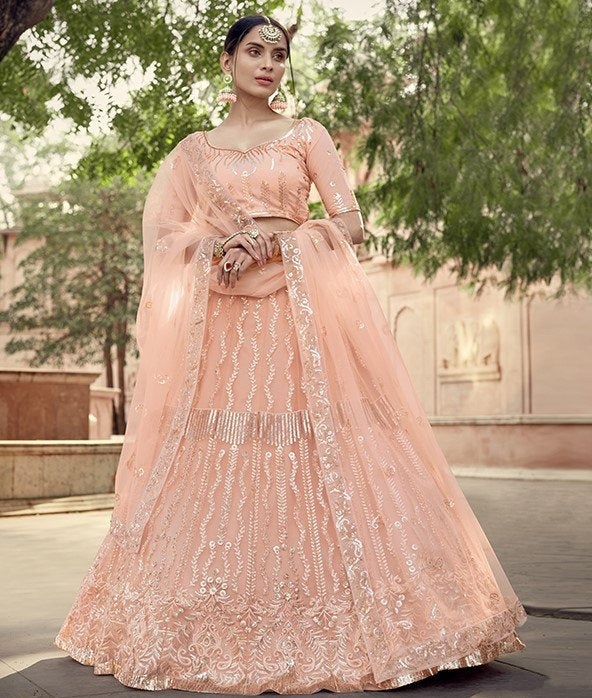 Peach soft net sequence work bridal lehenga choli