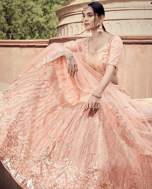 Peach soft net sequence work bridal lehenga choli