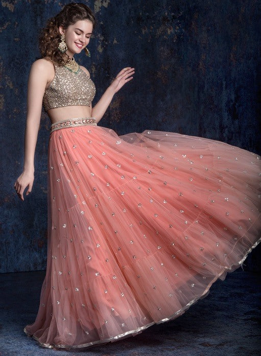 Peach soft net sequence work ceremonial lehenga choli
