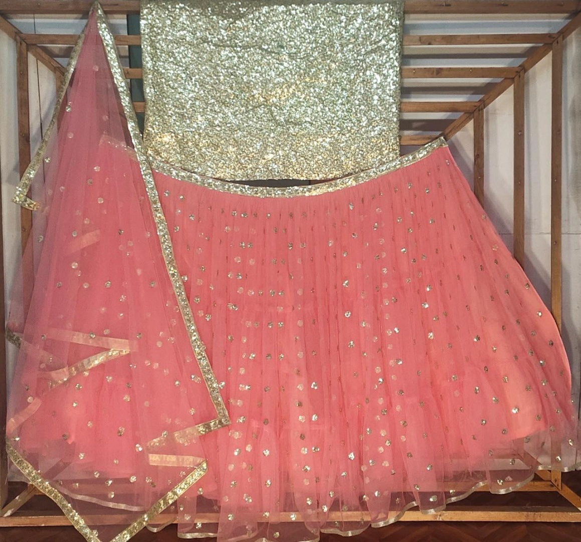 Peach soft net sequence work ceremonial lehenga choli