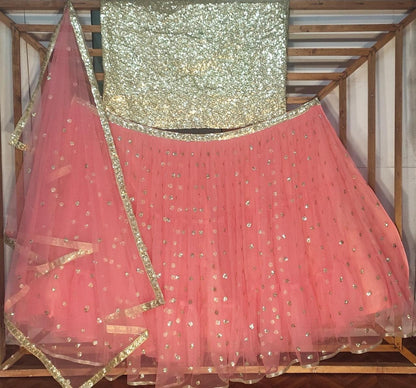 Peach soft net sequence work ceremonial lehenga choli