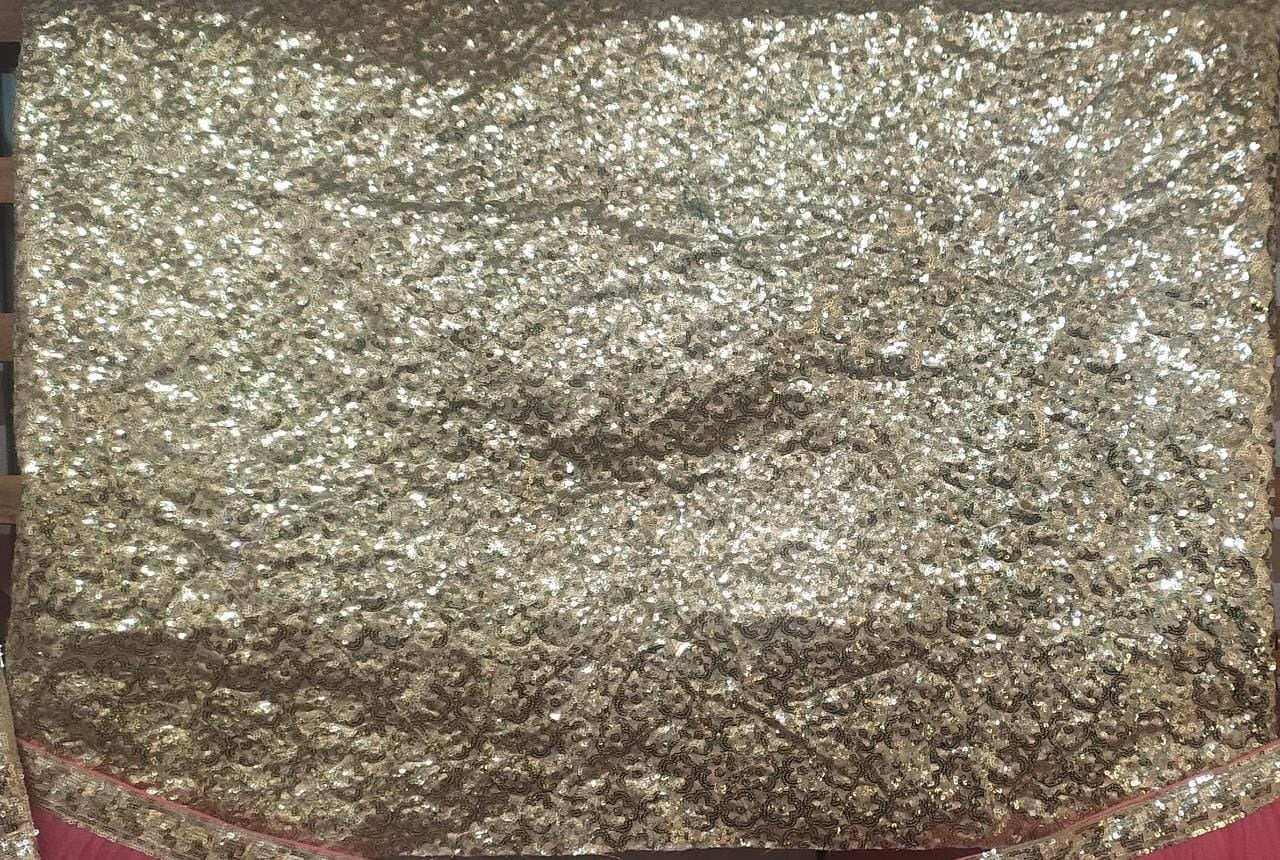 Peach soft net sequence work ceremonial lehenga choli