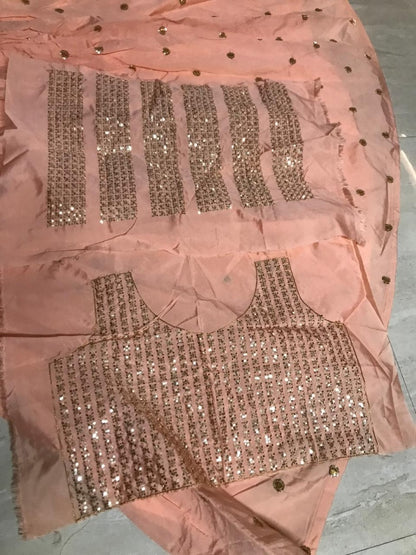 Peach tapeta silk sequence and zari worked crop top lehenga