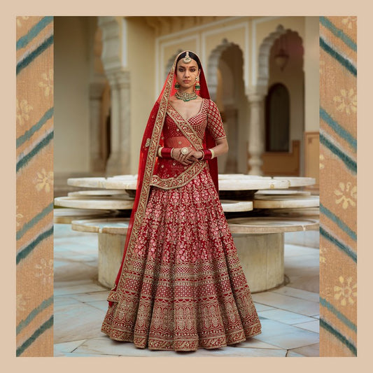 Pink floral embroidery on red base art silk bridal lehenga