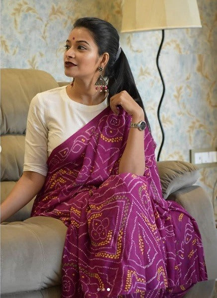 Pink georgette bandhani print traditional saree