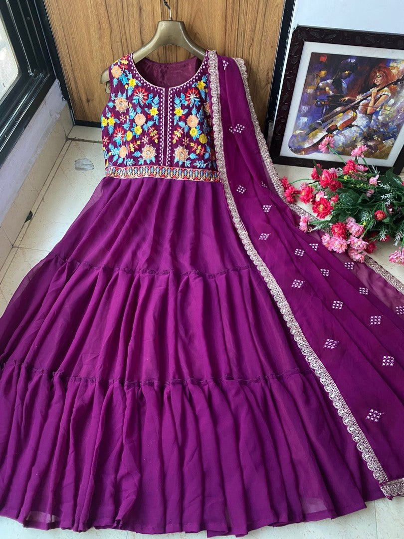 Pink georgette embroidered ruffle layer gown