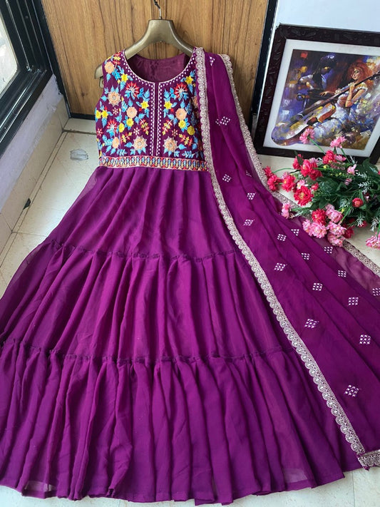 Pink georgette embroidered ruffle layer gown