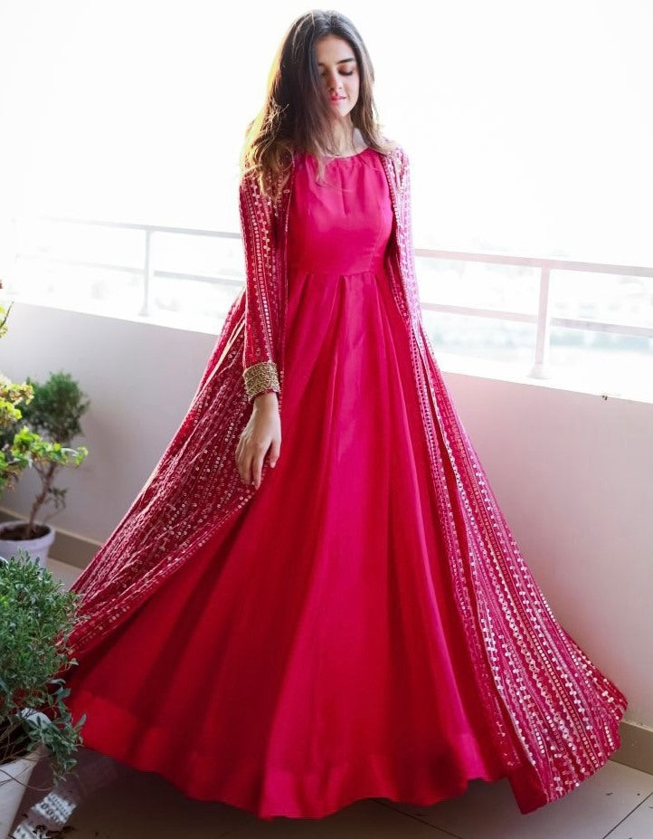 Pink georgette gown with heavy embroidery work koti shrug