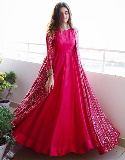 Pink georgette gown with heavy embroidery work koti shrug