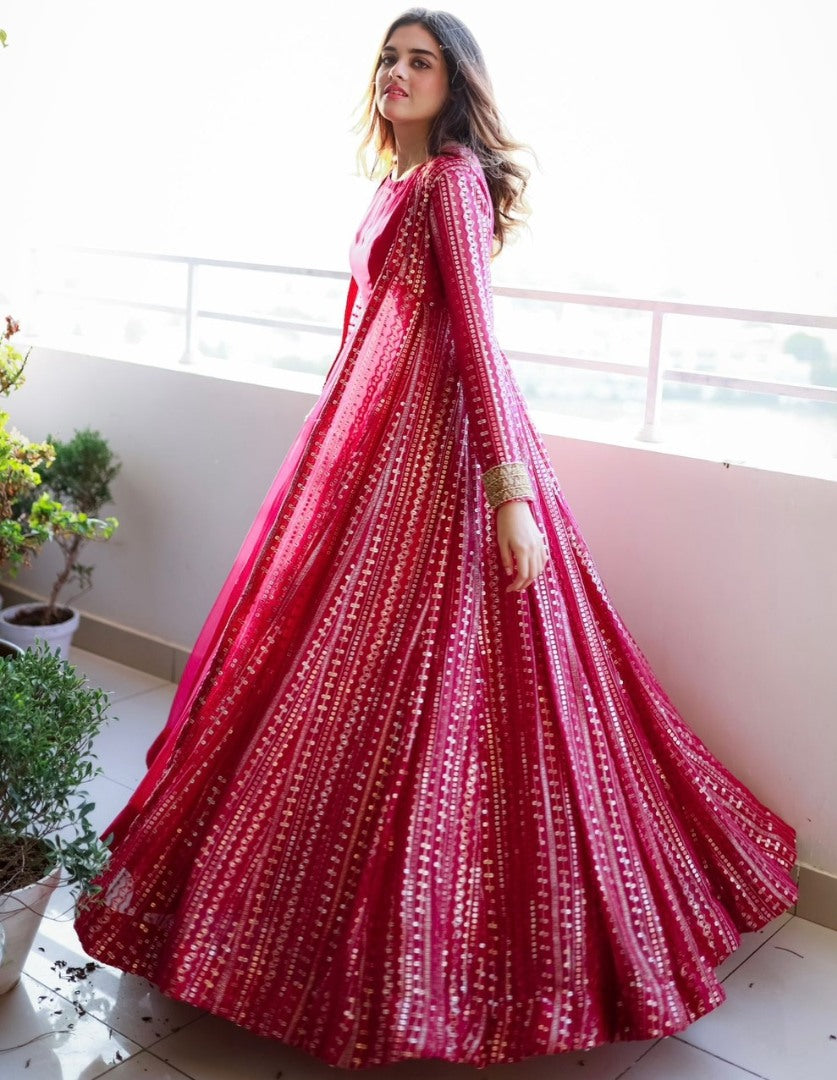 Pink georgette gown with heavy embroidery work koti shrug
