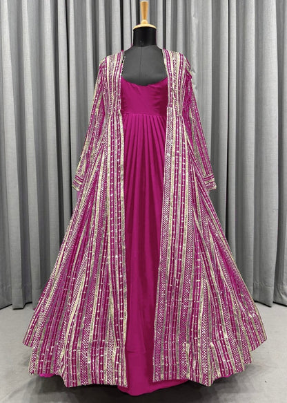 Pink georgette gown with heavy embroidery work koti shrug