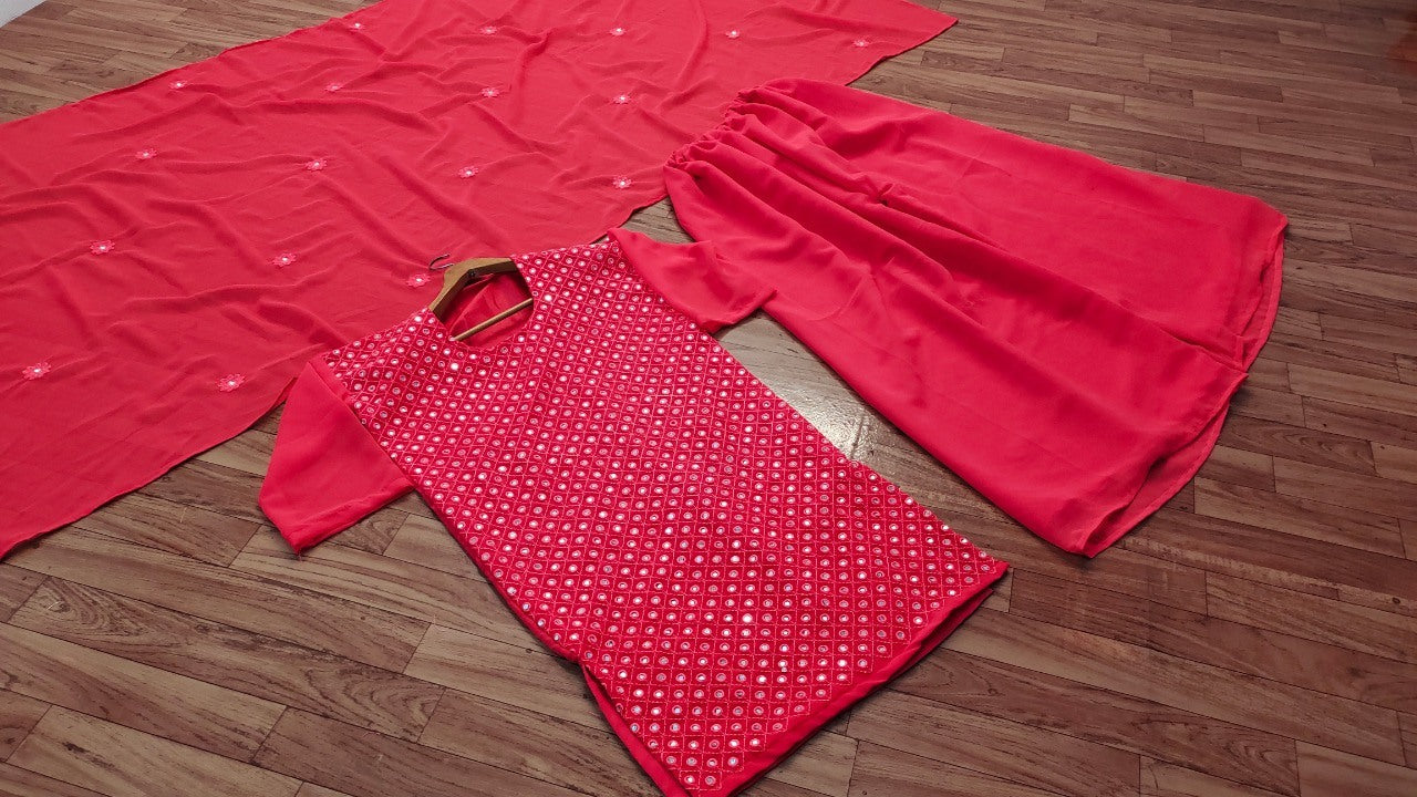 Pink georgette heavy embroidered mirror work salwar with palzzo