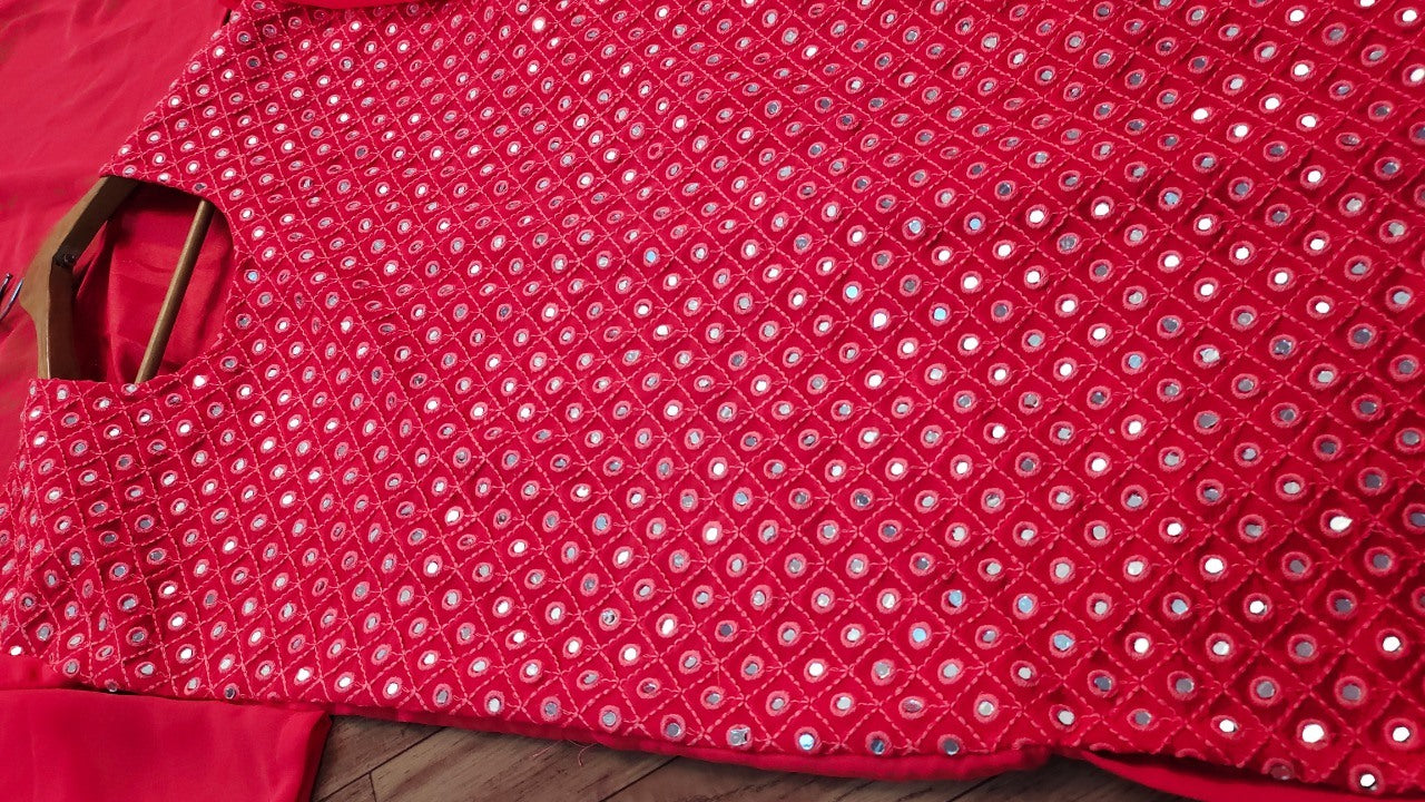 Pink georgette heavy embroidered mirror work salwar with palzzo