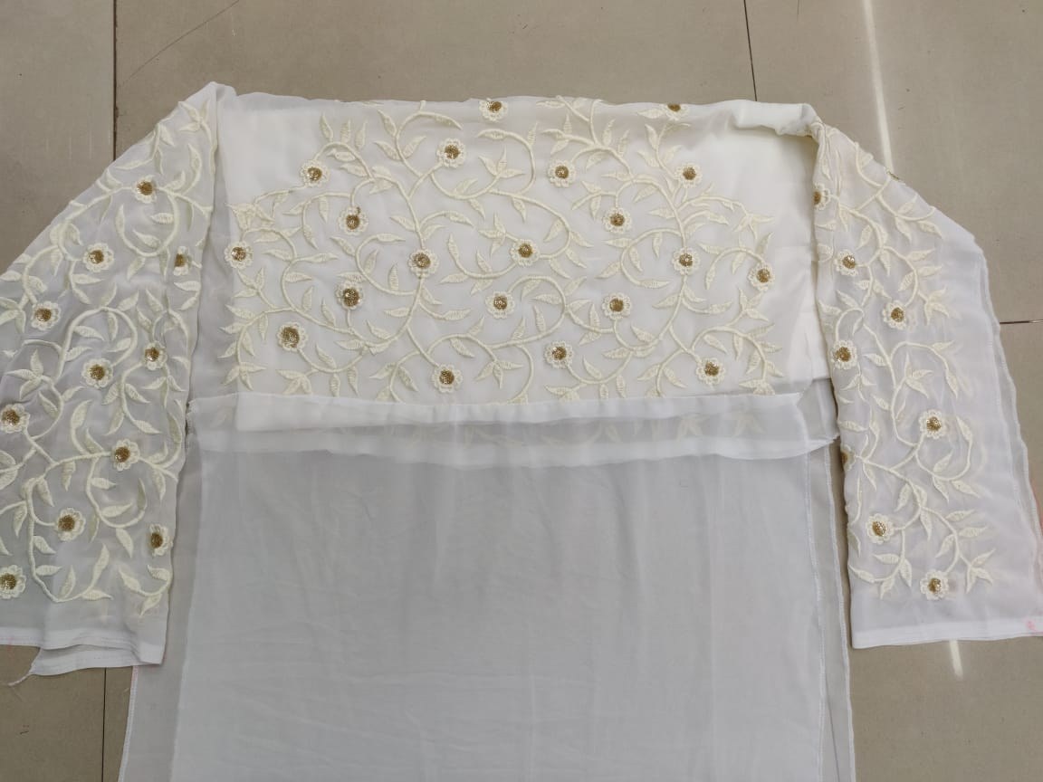 Pink georgette lehenga with white long top lehenga suit