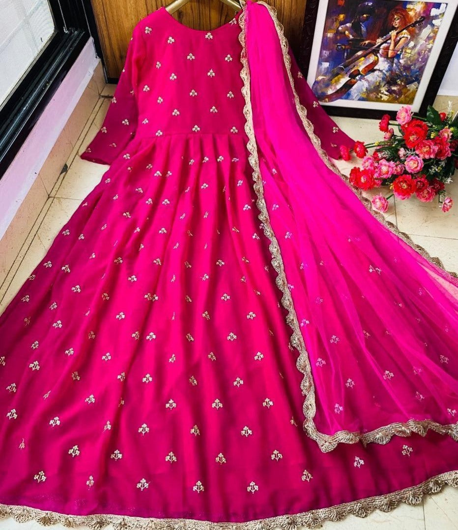 Pink heavy georgette with embroidered work party wear gown