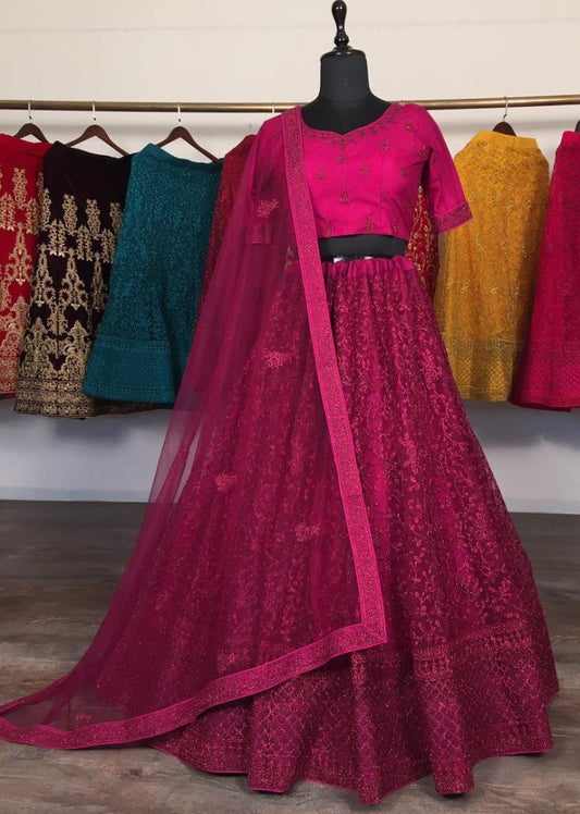 Pink net glitter zari embroidery work lehenga choli