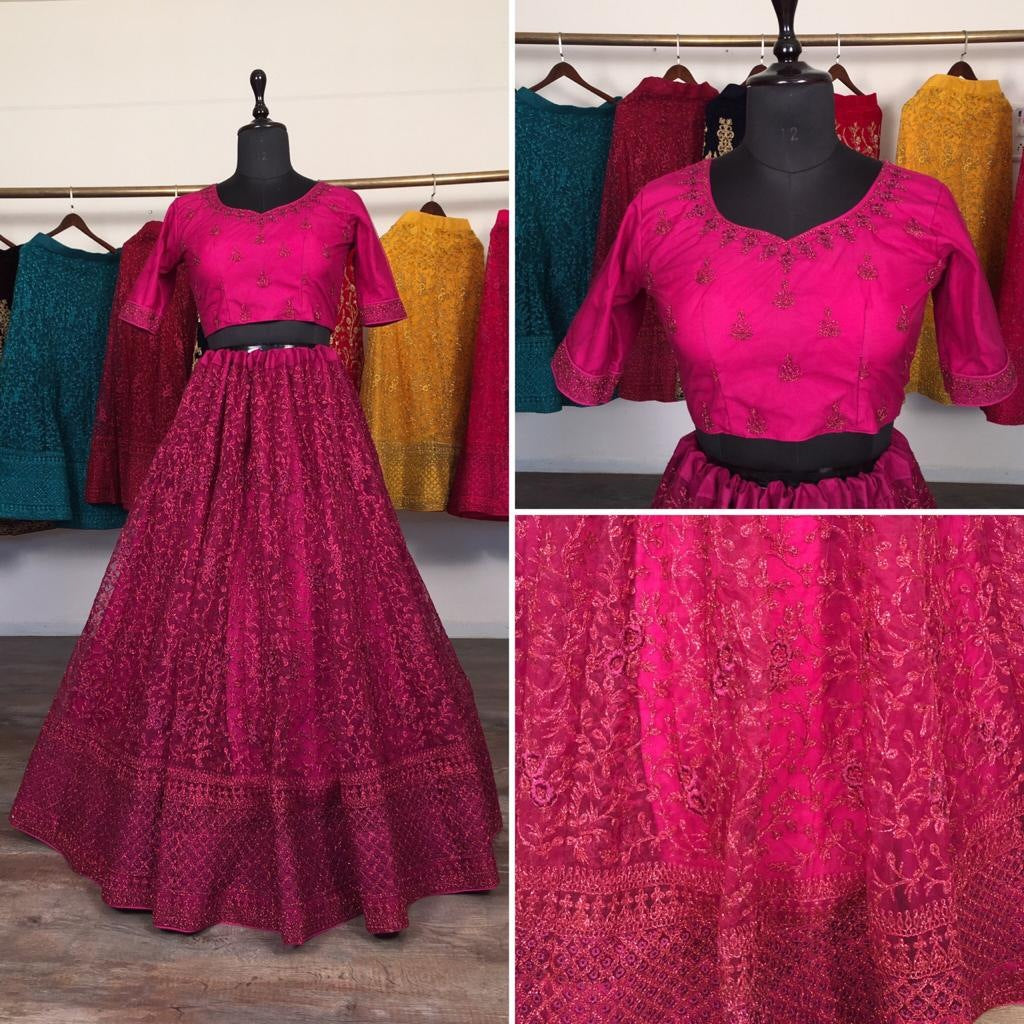 Pink net glitter zari embroidery work lehenga choli