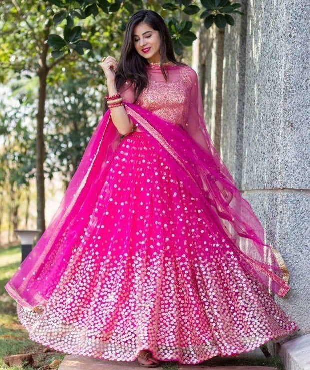 Pink net heavy sequin work wedding lehenga choli