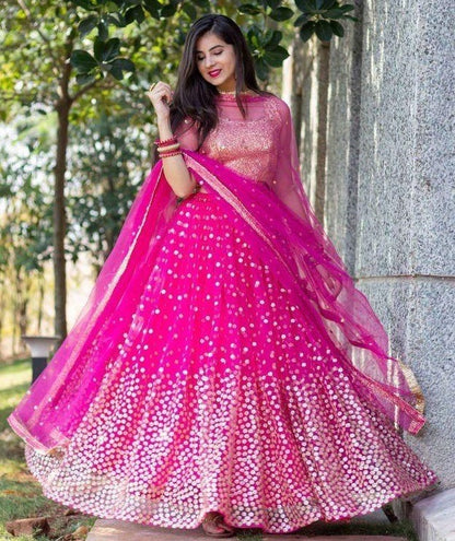 Pink net heavy sequin work wedding lehenga choli