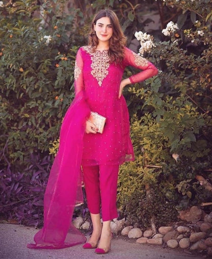 Pink nylon mono net sequence pearl rivet work salwar suit