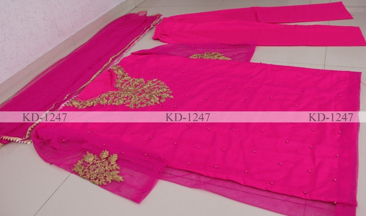 Pink nylon mono net sequence pearl rivet work salwar suit