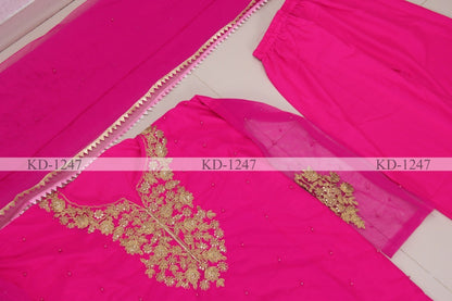 Pink nylon mono net sequence pearl rivet work salwar suit