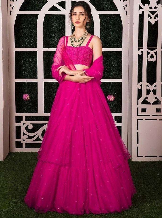 Pink two layer net pearl work lehenga choli