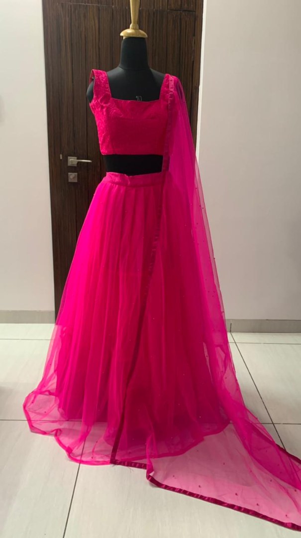 Pink two layer net pearl work lehenga choli