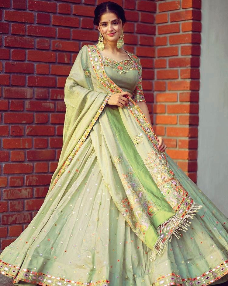 Pista green butter silk embroidered ceremonial lehenga choli