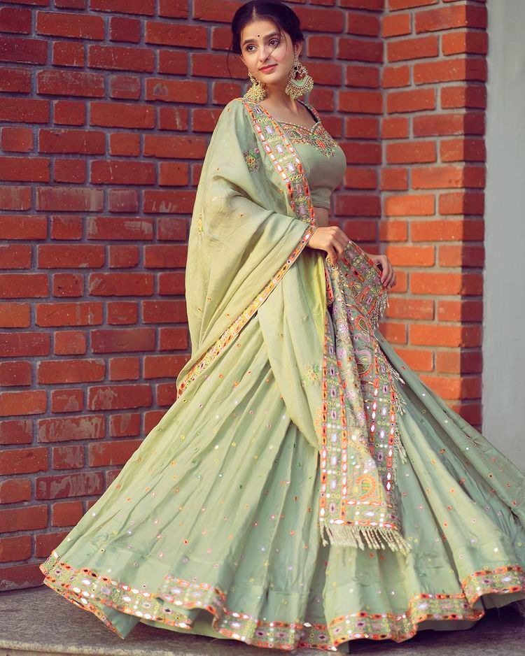Pista green butter silk embroidered ceremonial lehenga choli