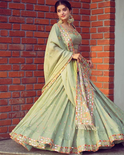 Pista green butter silk embroidered ceremonial lehenga choli