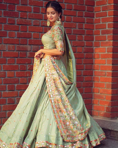 Pista green butter silk embroidered ceremonial lehenga choli