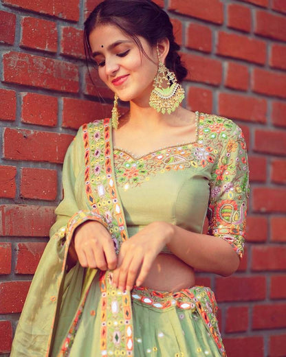 Pista green butter silk embroidered ceremonial lehenga choli