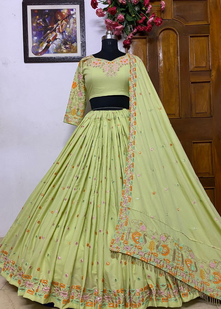 Pista green butter silk embroidered ceremonial lehenga choli