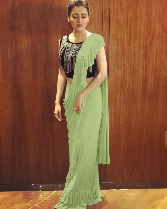 Pista green crepe silk designer ruffle saree with handwork blouse