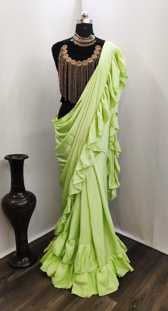 Pista green crepe silk designer ruffle saree with handwork blouse