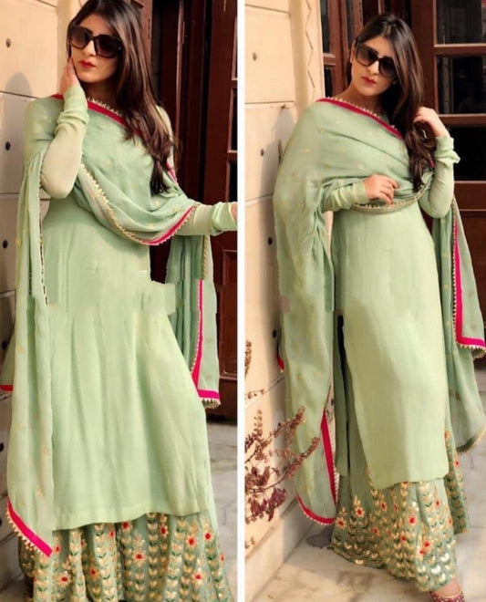 pista green embroidered partywear plazzo suit