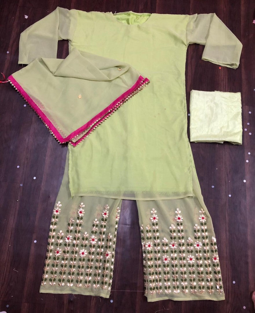 pista green embroidered partywear plazzo suit