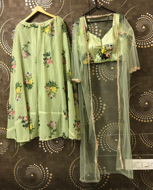 Pista green floral printed crop top lehenga with shrug