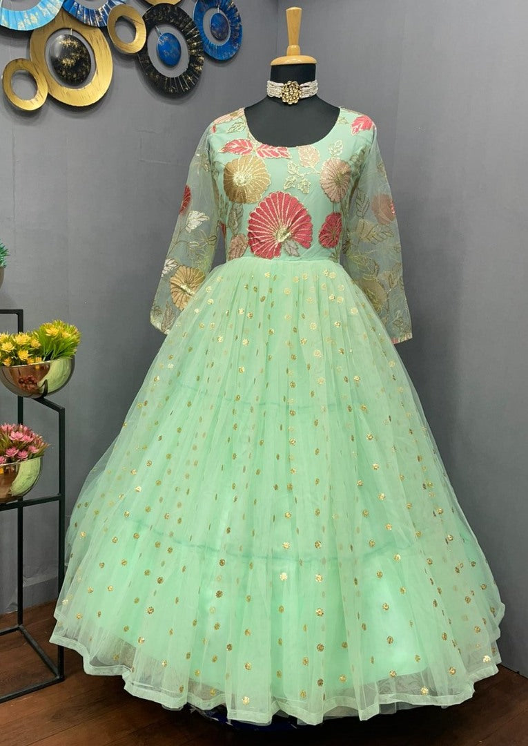 Pista green georgette and soft net embroidered gown