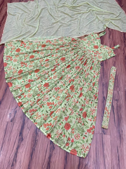 Pista green georgette flower printed and sequence work gown