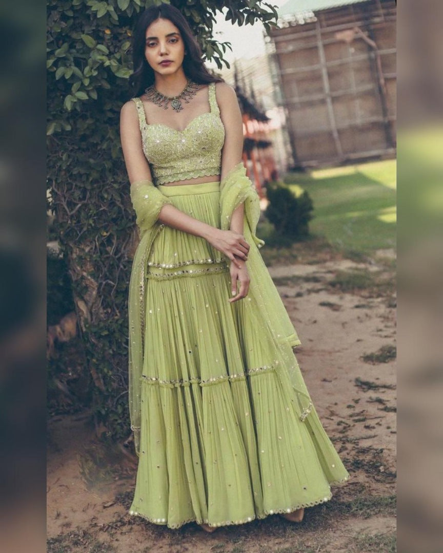 Pista green georgette paper mirror work ruffle lehenga choli