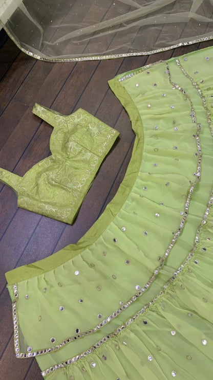 Pista green georgette paper mirror work ruffle lehenga choli