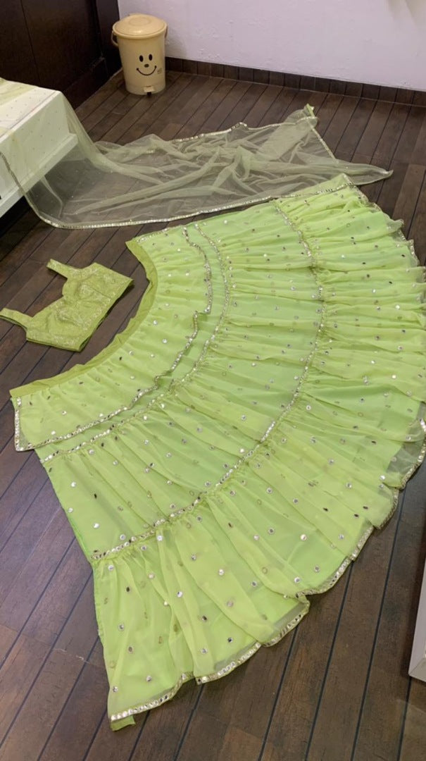 Pista green georgette paper mirror work ruffle lehenga choli