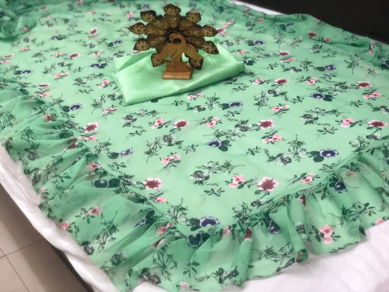 Pista green goergette digital printed ruffle saree