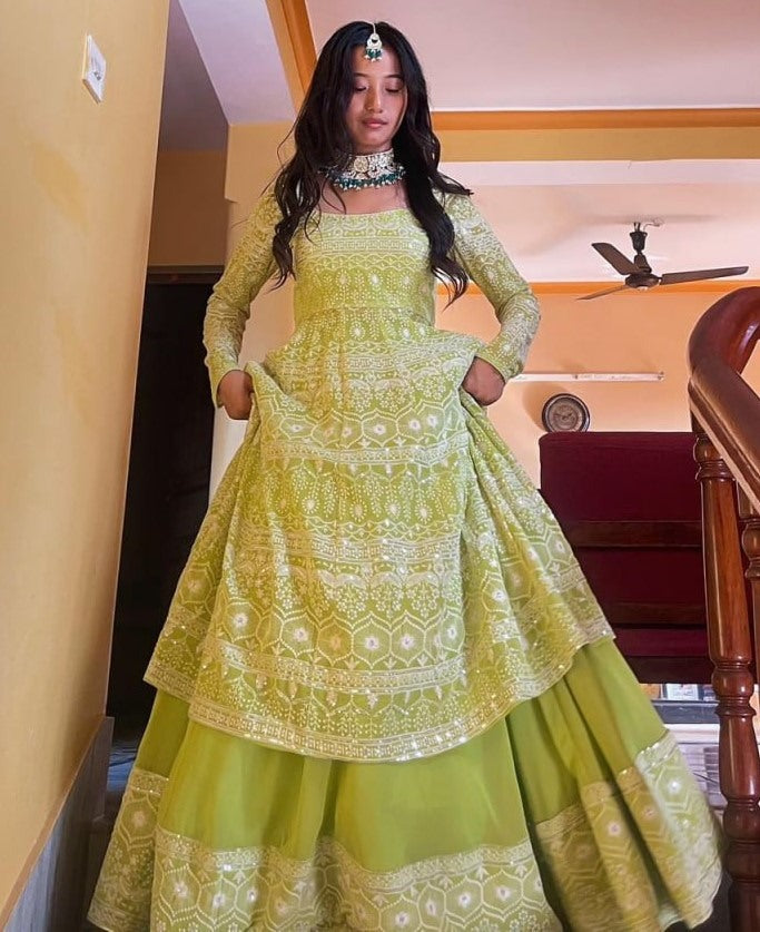 Pista green heavy embroidery worked lehenga suit for wedding ceremony