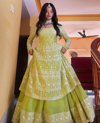 Pista green heavy embroidery worked lehenga suit for wedding ceremony