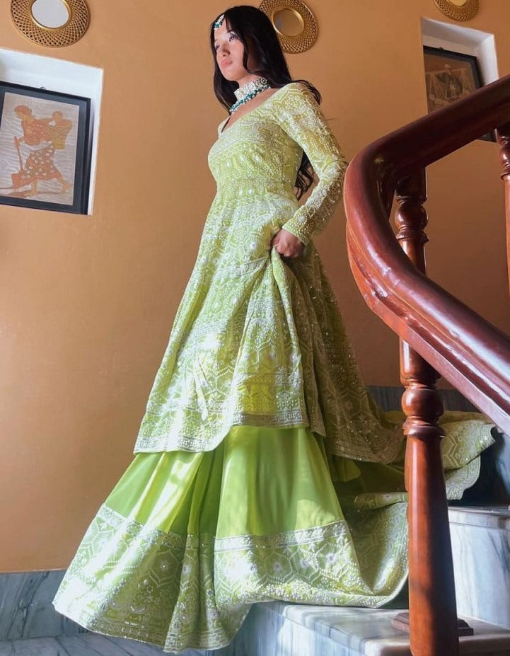 Pista green heavy embroidery worked lehenga suit for wedding ceremony